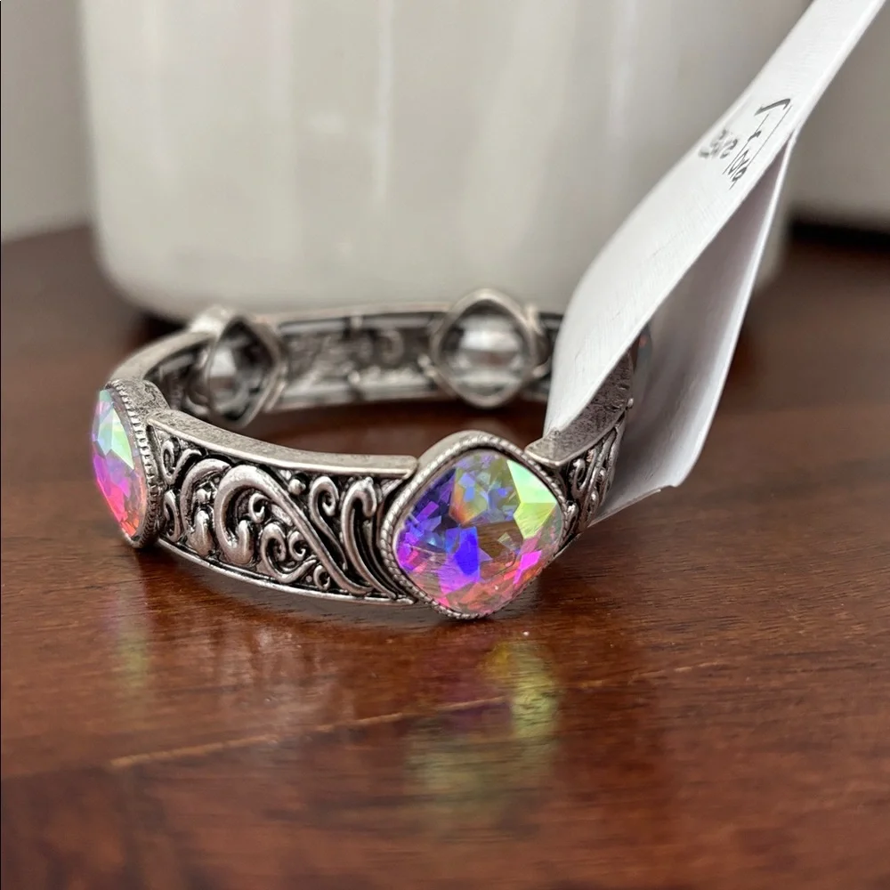 Laura Firs Stretch Embossed Silvertone w/iridescent beveled stones,stretch